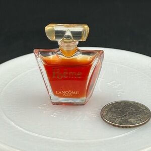 Lancome Poême Perfume Bottle with Orange Tint